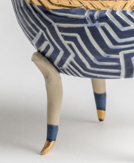 blue and white robot candy bowl