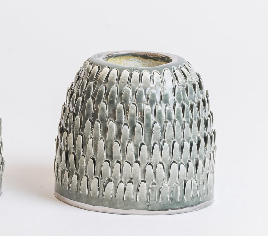 green spiked candlesticks